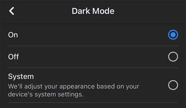 Facebook for iPhone in dark mode.