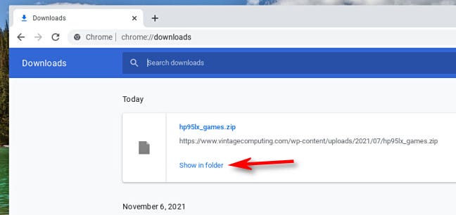 W Chome na Chromebooku kliknij „Pokaż w folderze”.