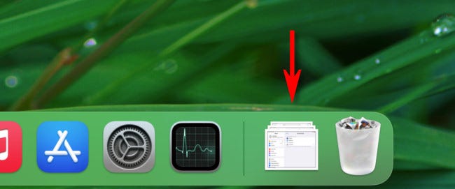 In the Mac dock, click the Downloads stack or folder shortcut beside the trash can.
