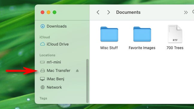 Locating the USB Flash drive in your Finder sidebar.