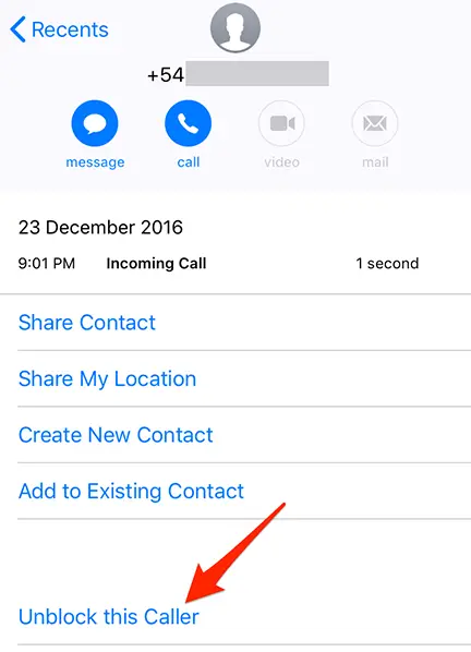 Tap "Unblock this Caller" on a phone number screen on iPhone.