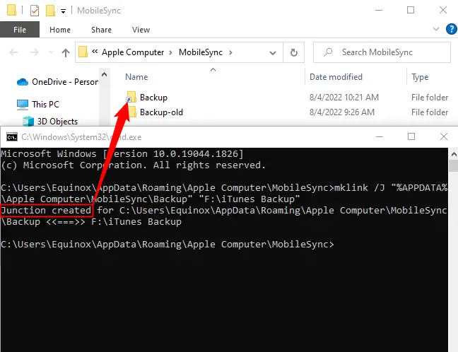 Command Prompt open over File Explorer, showing the symbolic link command and the link it created. 