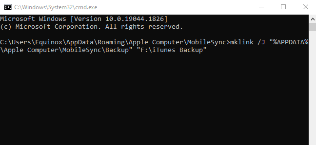 Command Prompt open to the new backup folder, with the symbolic link command pasted in. 